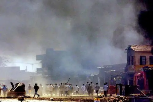 A 2002 file photograph of rioters in Ahmedabad. Associated Press/The Hindu.